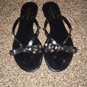 Valentino’s flip flops.